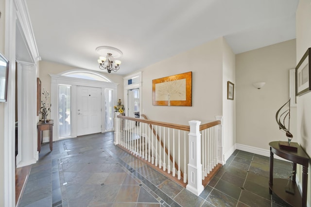 8321 Odowling Dr, Onsted, MI 49265 - entryway with stone tile flooring and a chandelier
