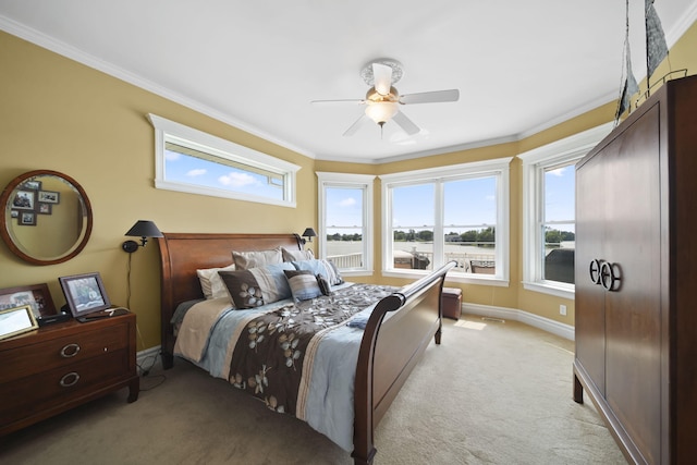 8321 Odowling Dr, Onsted, MI 49265 - bedroom featuring light colored carpet, ornamental molding, a water view, and ceiling fan