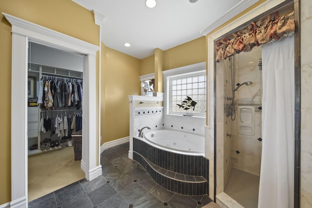 8321 Odowling Dr, Onsted, MI 49265 - full bathroom featuring a tub with jets, a shower stall, a walk in closet, and recessed lighting