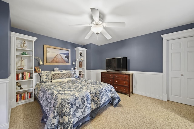 8321 Odowling Dr, Onsted, MI 49265 - bedroom featuring a wainscoted wall, carpet flooring, ceiling fan, and a closet