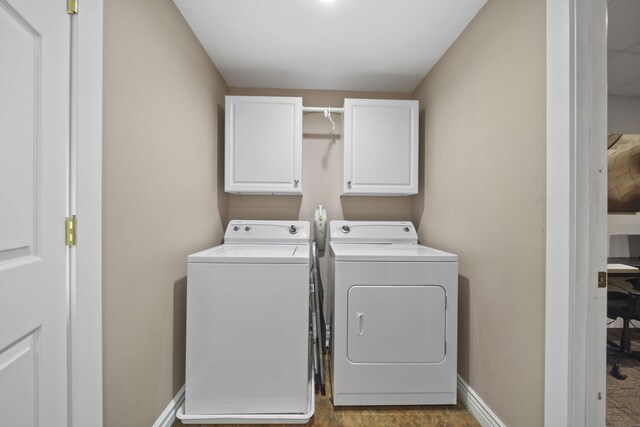 8321 Odowling Dr, Onsted, MI 49265 - laundry area with separate washer and dryer, cabinet space, and wood finished floors