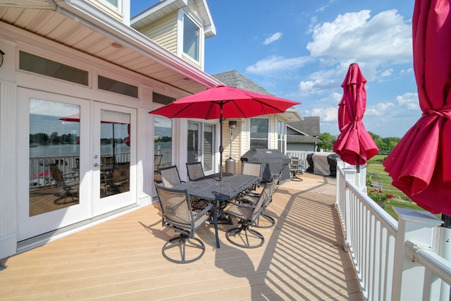 8321 Odowling Dr, Onsted, MI 49265 - wooden deck with outdoor dining area and a grill