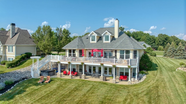 8321 Odowling Dr, Onsted, MI 49265 - rear view of house with a patio, stairs, a deck, a lawn, and a chimney