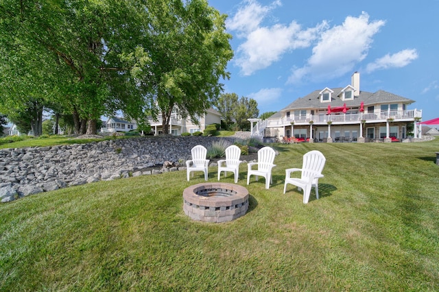8321 Odowling Dr, Onsted, MI 49265 - view of green lawn with an outdoor fire pit