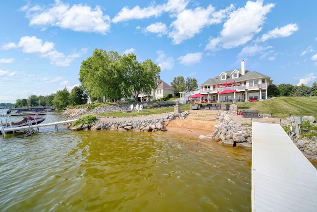 8321 Odowling Dr, Onsted, MI 49265 - dock with a deck with water view and a lawn