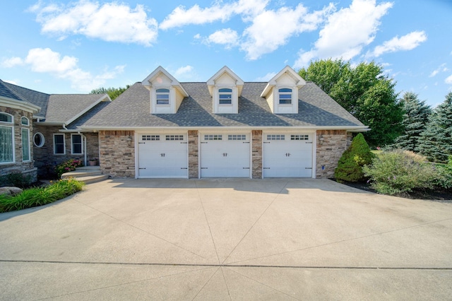 8321 Odowling Dr, Onsted, MI 49265 - view of front of house featuring stone siding and a shingled roof