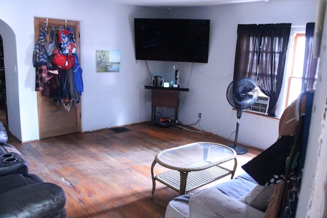 43 N Lincoln Ave, Niles, MI 49120 - living room featuring arched walkways and wood finished floors