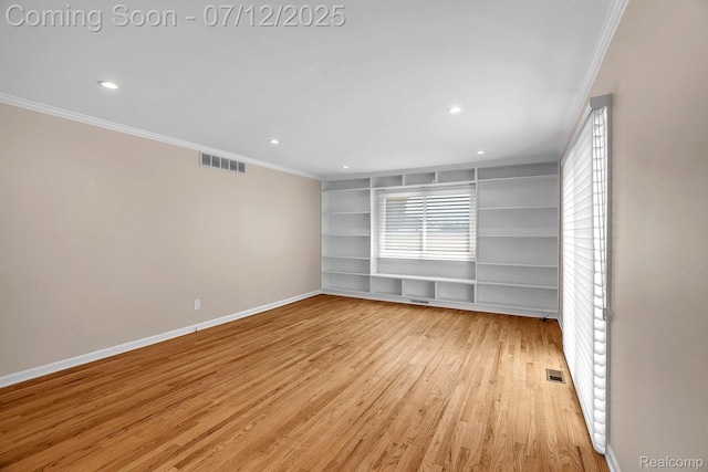 100 Billingsgate Ct, Bloomfield Hills, MI 48301 - spare room featuring ornamental molding, light wood-style floors, recessed lighting, and built in shelves
