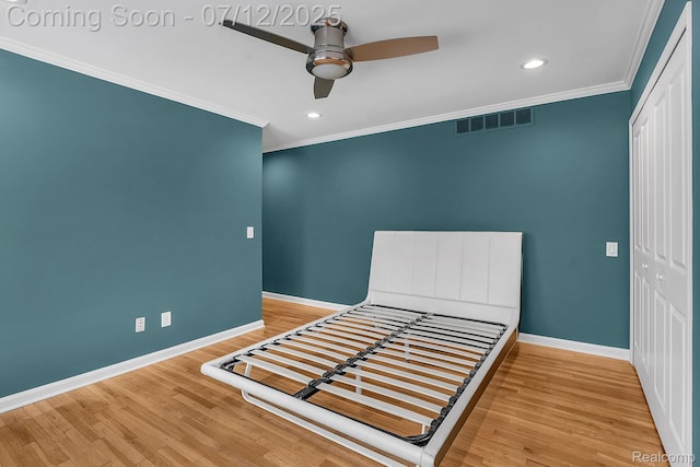100 Billingsgate Ct, Bloomfield Hills, MI 48301 - unfurnished bedroom with a closet, ornamental molding, wood finished floors, recessed lighting, and a ceiling fan