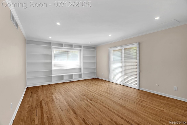 100 Billingsgate Ct, Bloomfield Hills, MI 48301 - unfurnished room featuring ornamental molding, plenty of natural light, wood finished floors, recessed lighting, and built in features