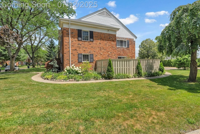 100 Billingsgate Ct, Bloomfield Hills, MI 48301 - view of property exterior with a lawn and brick siding