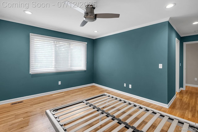 100 Billingsgate Ct, Bloomfield Hills, MI 48301 - spare room with a ceiling fan, ornamental molding, wood finished floors, and recessed lighting