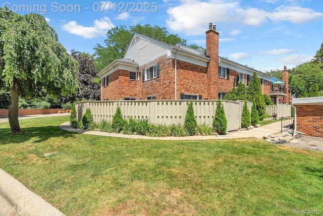 100 Billingsgate Ct, Bloomfield Hills, MI 48301 - view of property exterior with brick siding and a chimney
