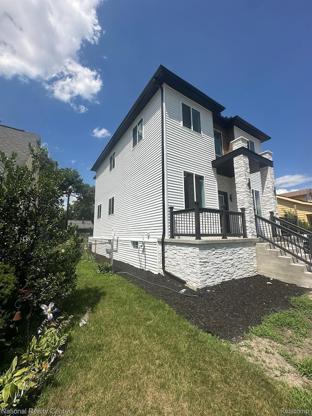 1666 Albany St, Ferndale, MI 48220 - view of home's exterior featuring a yard