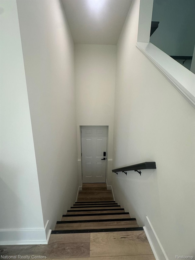 1666 Albany St, Ferndale, MI 48220 - stairs with wood finished floors and baseboards