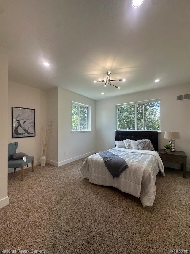1666 Albany St, Ferndale, MI 48220 - carpeted bedroom featuring recessed lighting and a chandelier