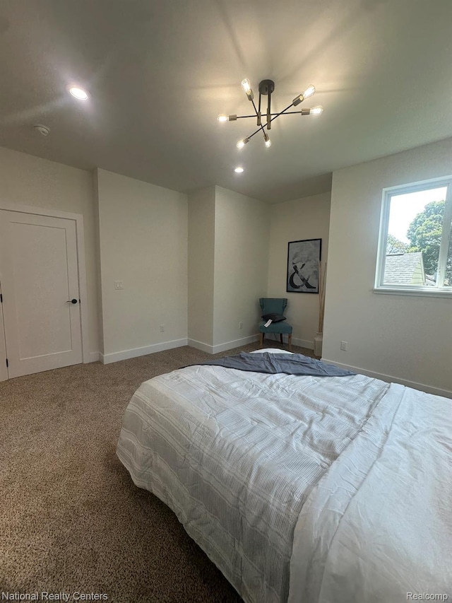 1666 Albany St, Ferndale, MI 48220 - carpeted bedroom with a chandelier and recessed lighting