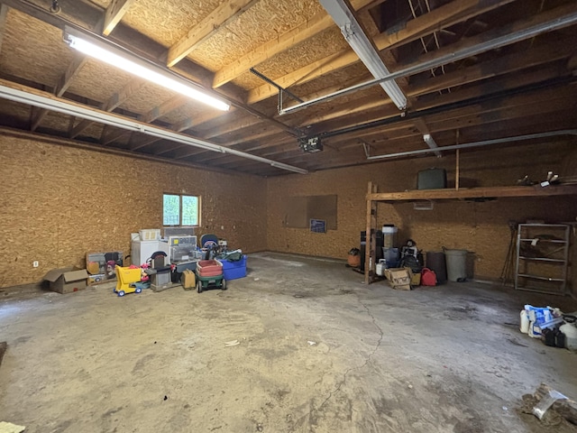 135 S Steer St, Addison, MI 49220 - garage featuring a garage door opener