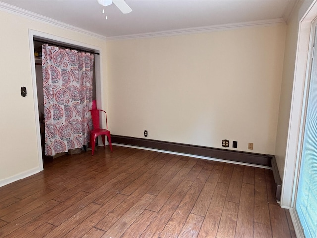 135 S Steer St, Addison, MI 49220 - spare room featuring hardwood / wood-style flooring, ornamental molding, and ceiling fan