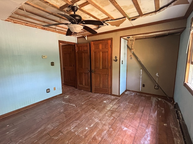 135 S Steer St, Addison, MI 49220 - unfurnished room with hardwood / wood-style floors and a ceiling fan