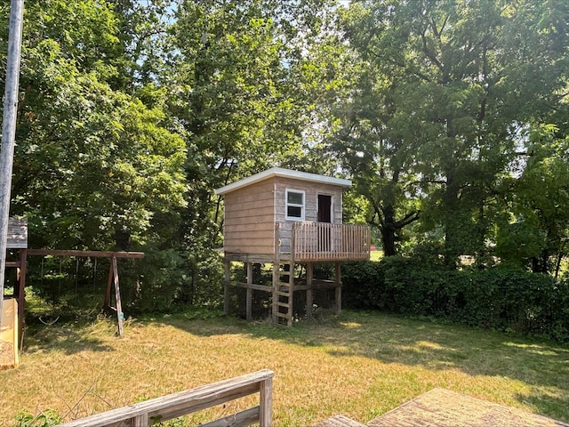 135 S Steer St, Addison, MI 49220 - view of grassy yard featuring view of wooded area
