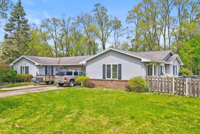 287-289 S Waverly Rd, Holland, MI 49423 - ranch-style house with brick siding and concrete driveway