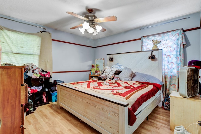 287-289 S Waverly Rd, Holland, MI 49423 - bedroom with light wood finished floors and ceiling fan