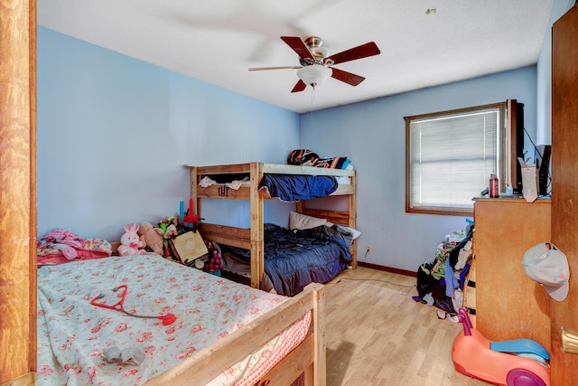 287-289 S Waverly Rd, Holland, MI 49423 - bedroom with wood finished floors and a ceiling fan