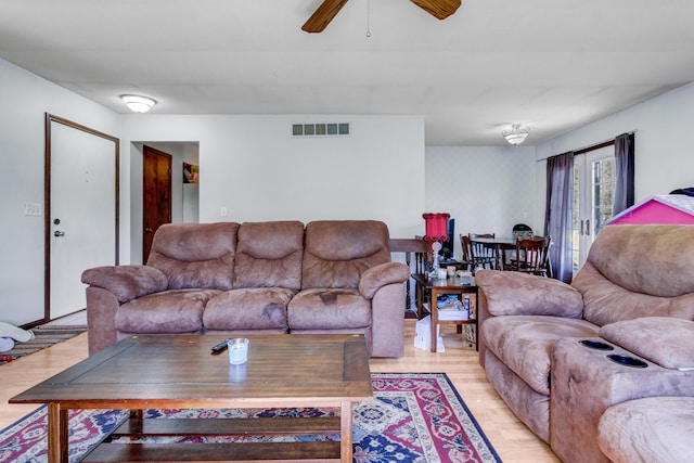 287-289 S Waverly Rd, Holland, MI 49423 - living area with light wood-style flooring and ceiling fan