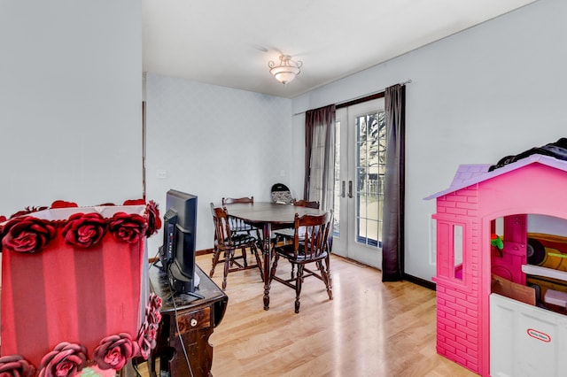 287-289 S Waverly Rd, Holland, MI 49423 - dining space with baseboards and wood finished floors
