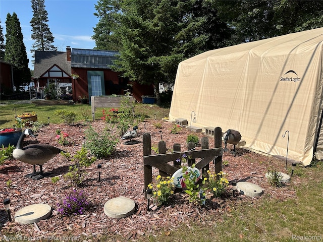 7351 Chain Lake Dr, South Branch, MI 48761 - view of grassy yard featuring an outdoor structure