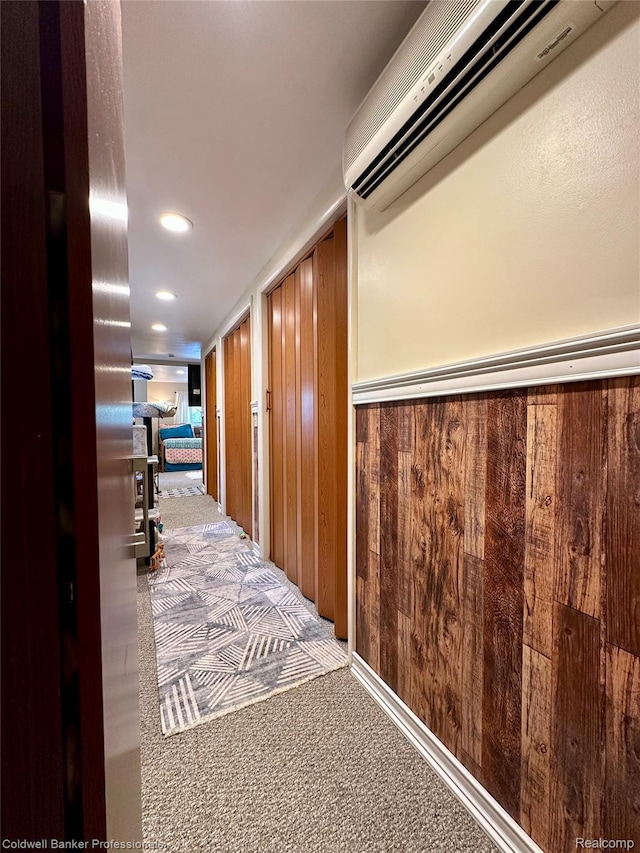7351 Chain Lake Dr, South Branch, MI 48761 - hall with carpet, a wall unit AC, and recessed lighting