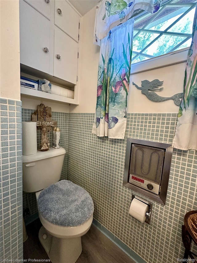 7351 Chain Lake Dr, South Branch, MI 48761 - bathroom with tile walls, wainscoting, and wood finished floors