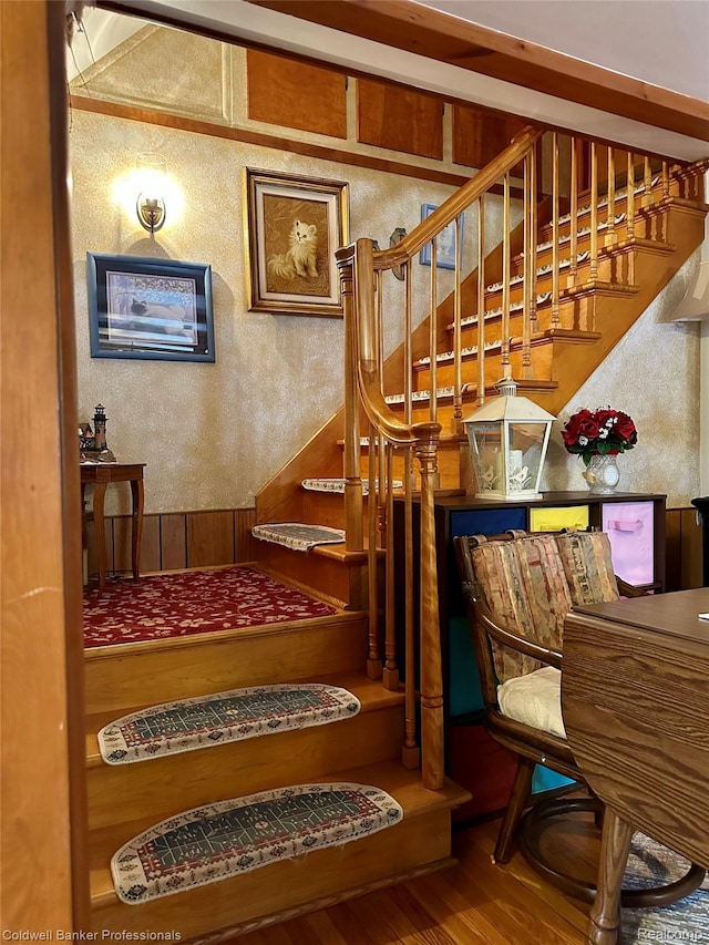 7351 Chain Lake Dr, South Branch, MI 48761 - staircase with wood finished floors and a textured wall