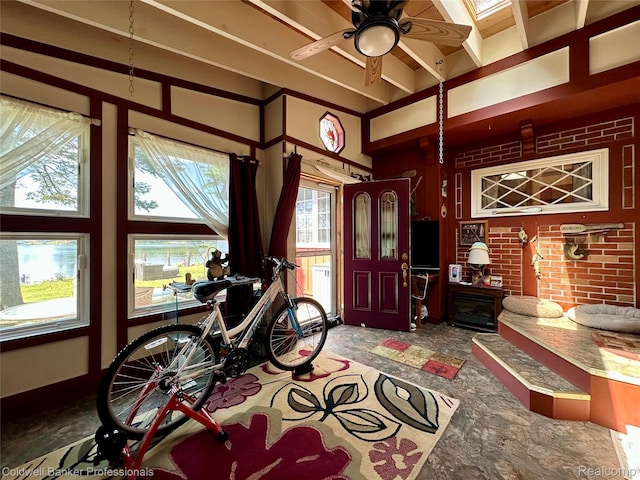 7351 Chain Lake Dr, South Branch, MI 48761 - foyer entrance with a ceiling fan and beamed ceiling