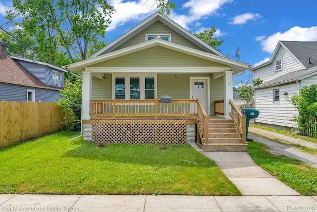 509 13th St, Port Huron, MI 48060 - bungalow featuring a porch
