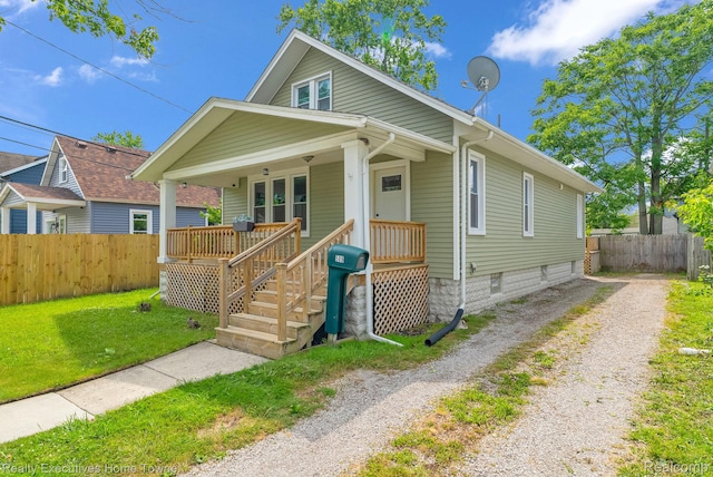 509 13th St, Port Huron, MI 48060 - bungalow-style home with driveway and covered porch