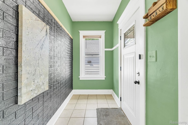 509 13th St, Port Huron, MI 48060 - entryway with tile patterned flooring and baseboards