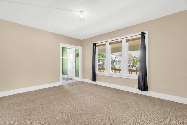 509 13th St, Port Huron, MI 48060 - empty room with carpet flooring and baseboards