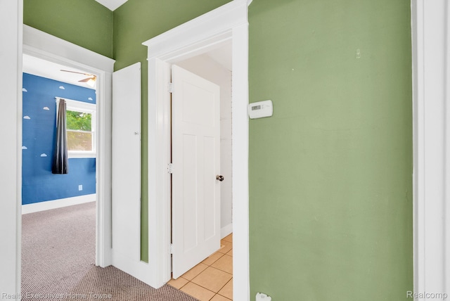 509 13th St, Port Huron, MI 48060 - hallway featuring light tile patterned floors and baseboards