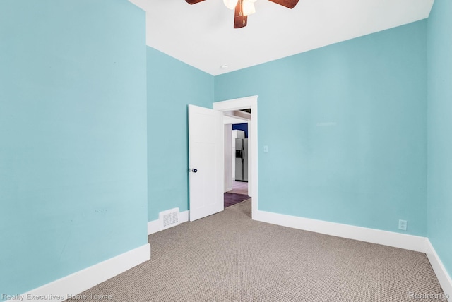 509 13th St, Port Huron, MI 48060 - unfurnished room featuring ceiling fan and carpet flooring