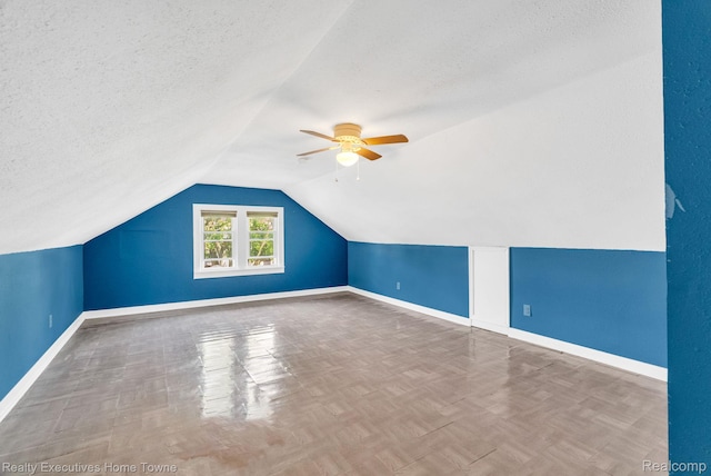 509 13th St, Port Huron, MI 48060 - bonus room with a textured ceiling, a ceiling fan, and lofted ceiling