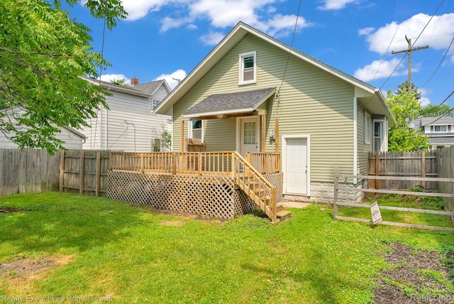 509 13th St, Port Huron, MI 48060 - rear view of house featuring a fenced backyard and a deck