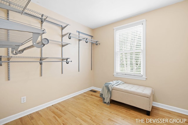 817 Central Ave, Holland, MI 49423 - walk in closet featuring wood finished floors
