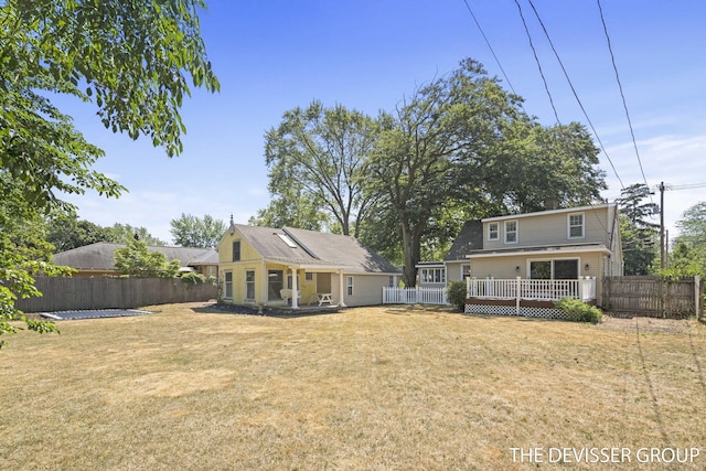 817 Central Ave, Holland, MI 49423 - back of house featuring a fenced backyard and a wooden deck