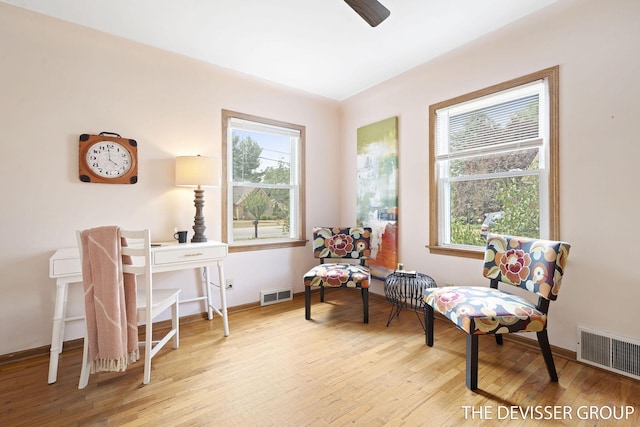 817 Central Ave, Holland, MI 49423 - living area featuring wood finished floors and ceiling fan