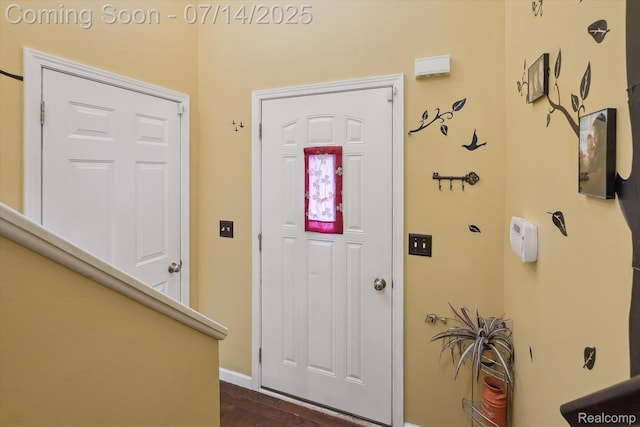 9481 Common Trl, Pinckney, MI 48169 - entryway with baseboards and dark wood-type flooring