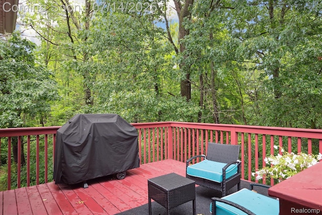 9481 Common Trl, Pinckney, MI 48169 - deck featuring a grill and an outdoor living space