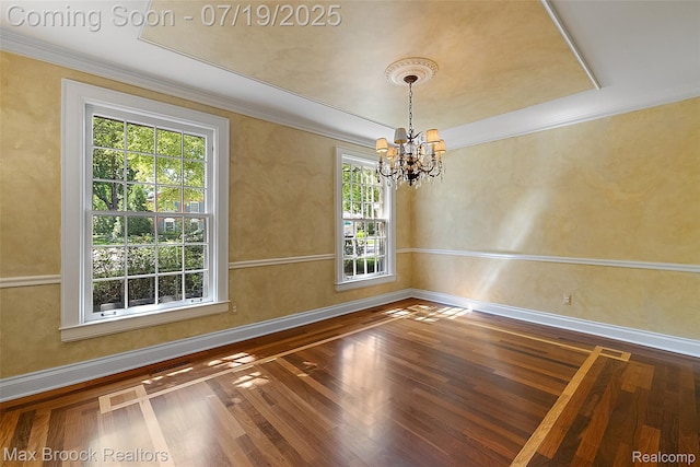 748 Waddington St, Bloomfield Hills, MI 48301 - unfurnished room with a chandelier, wood finished floors, crown molding, and a raised ceiling