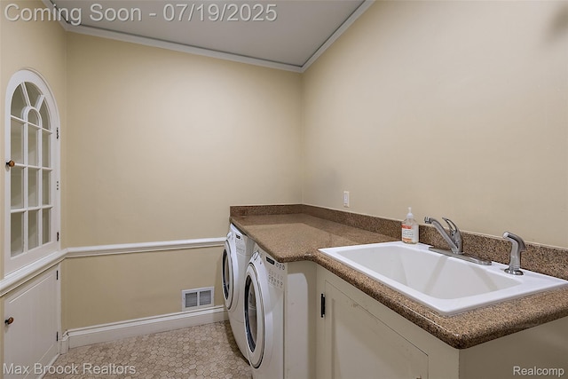 748 Waddington St, Bloomfield Hills, MI 48301 - washroom with washer and dryer, ornamental molding, and light tile patterned floors